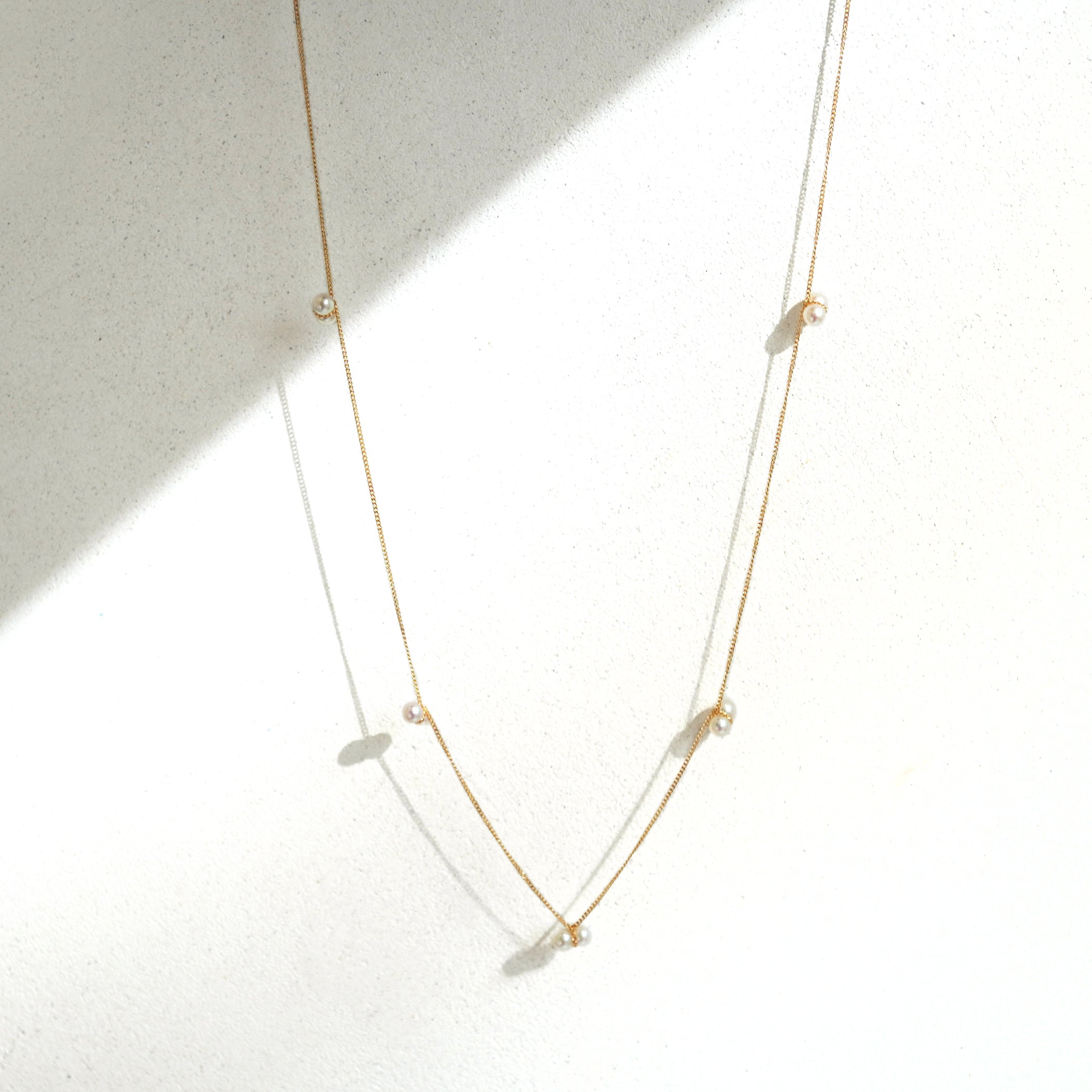 TWIN PEARL NECKLACE STATION