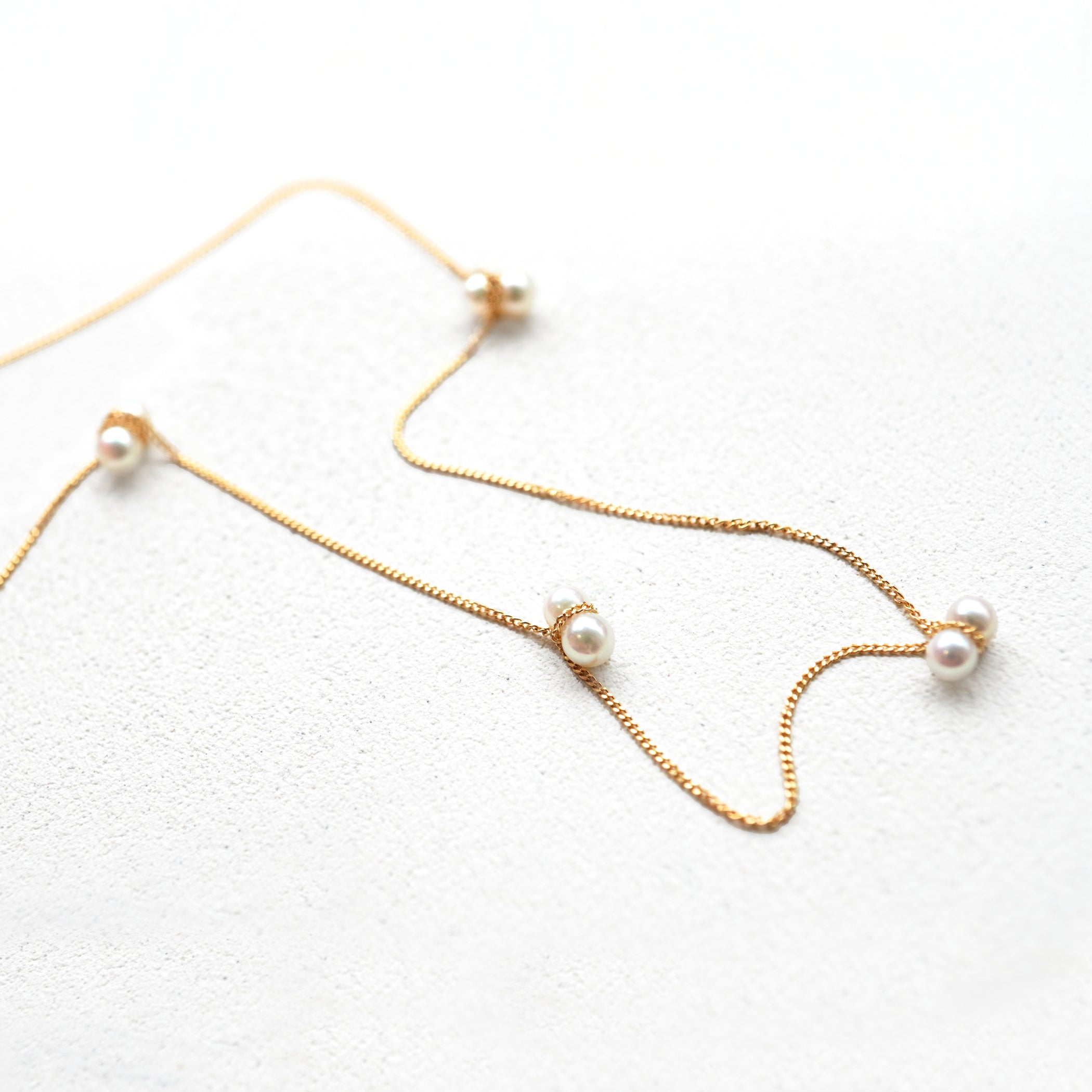 TWIN PEARL NECKLACE STATION