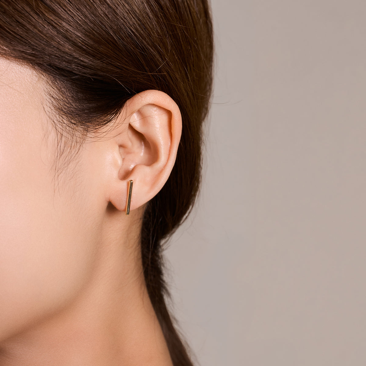 DENT BESIDE EARRINGS