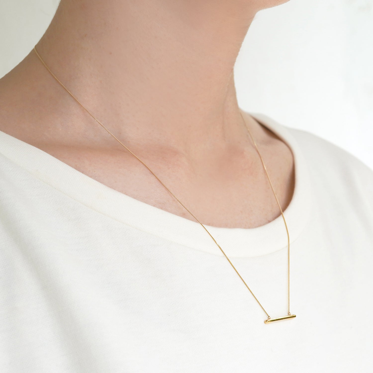 DENT BESIDE NECKLACE